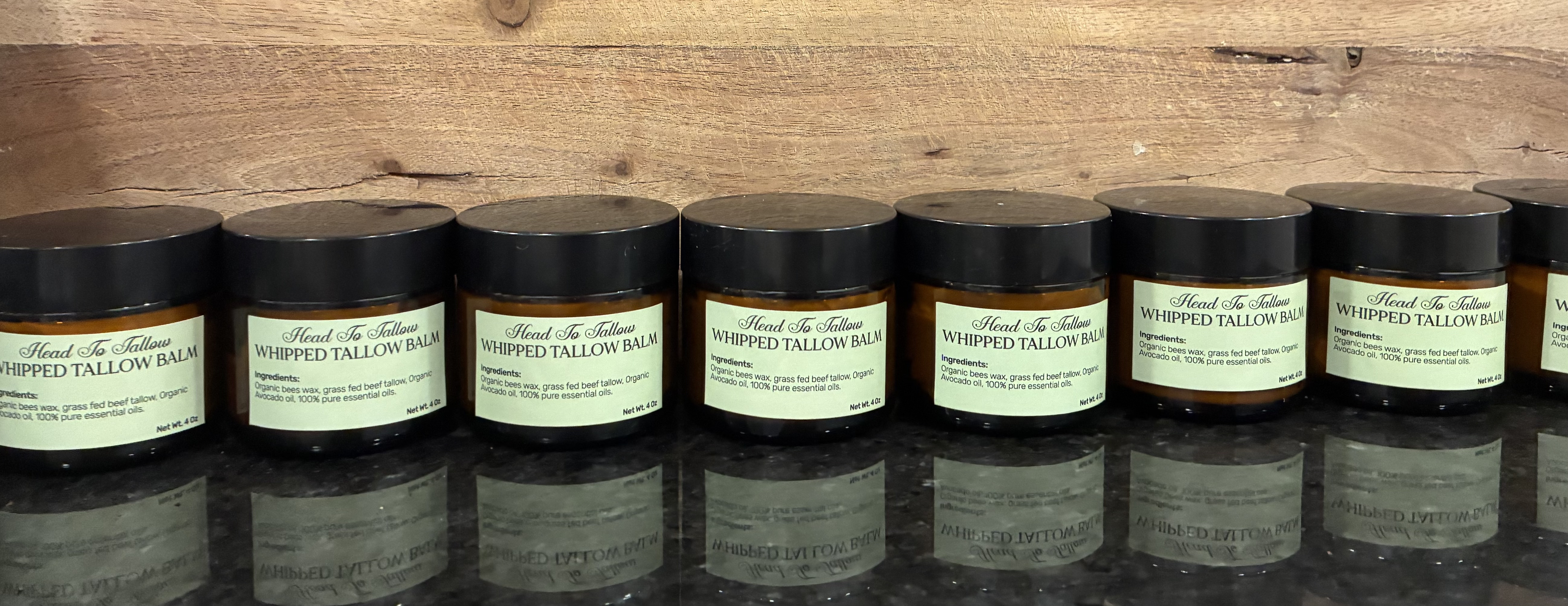 A lineup of Head to Tallow whipped tallow balm jars